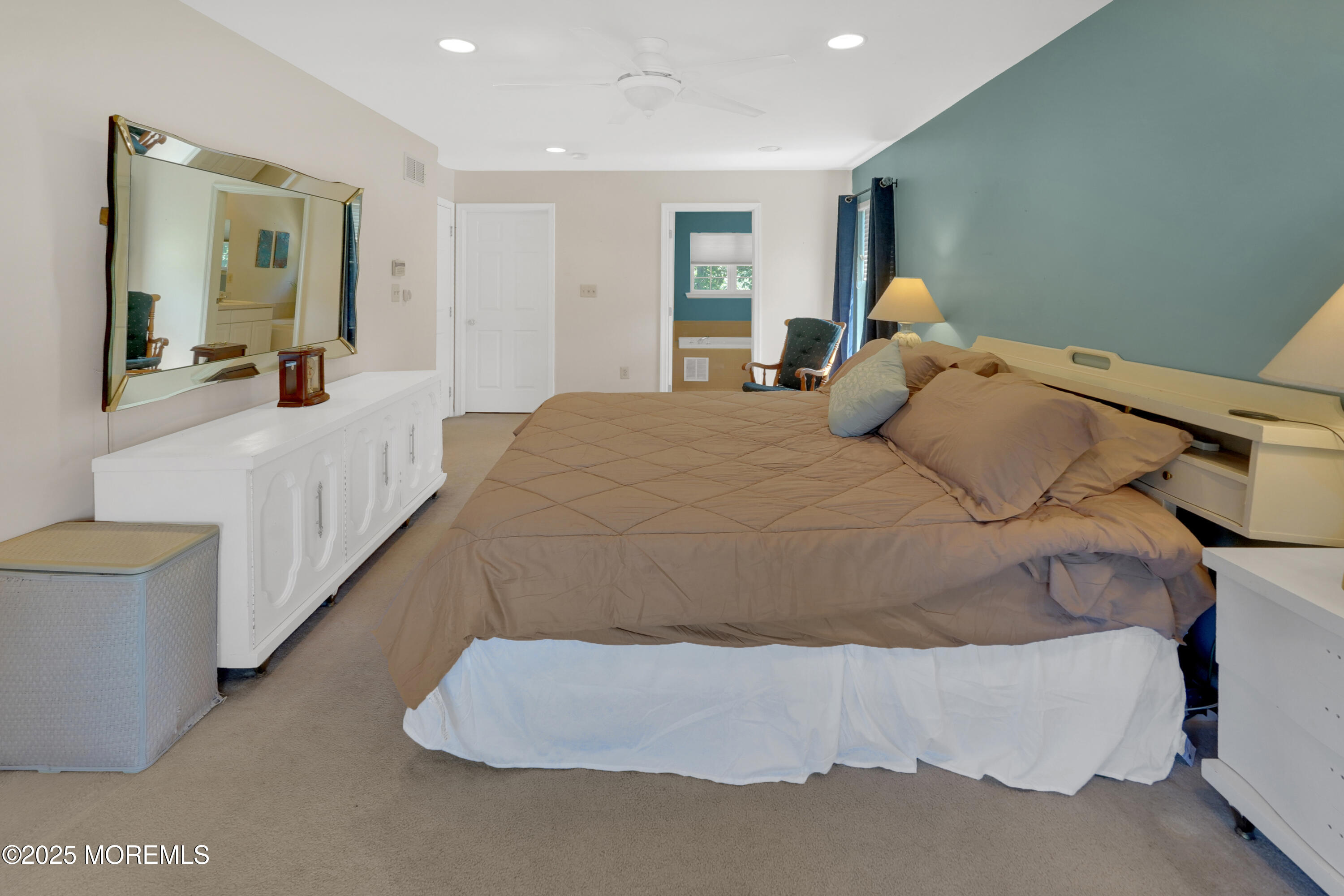 3 Diamond Lane Howell, NJ 07731 - Photo 19 of 43 a large bed sitting in a bedroom and chair