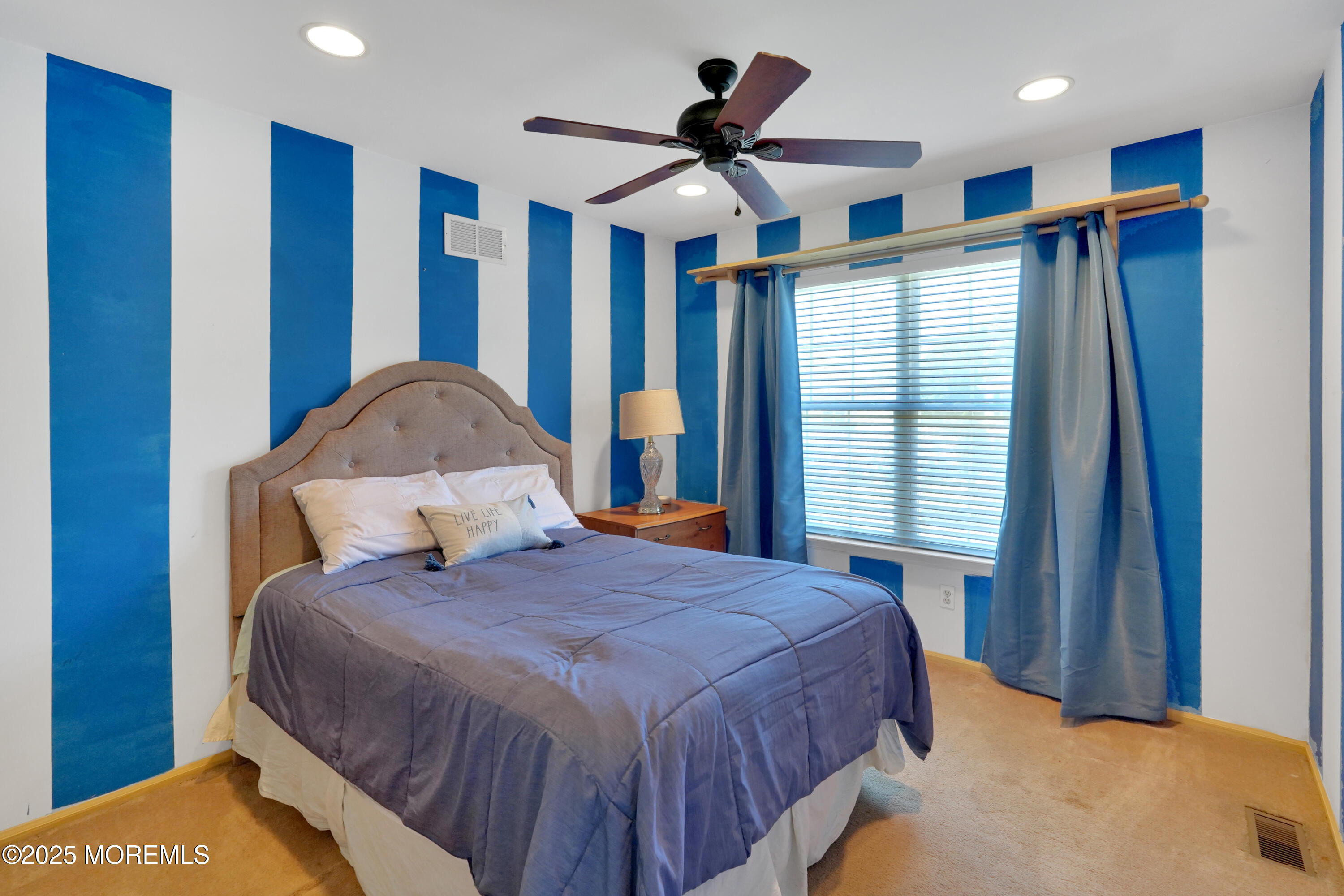 3 Diamond Lane Howell, NJ 07731 - Photo 22 of 43 a bedroom with a bed and a large window