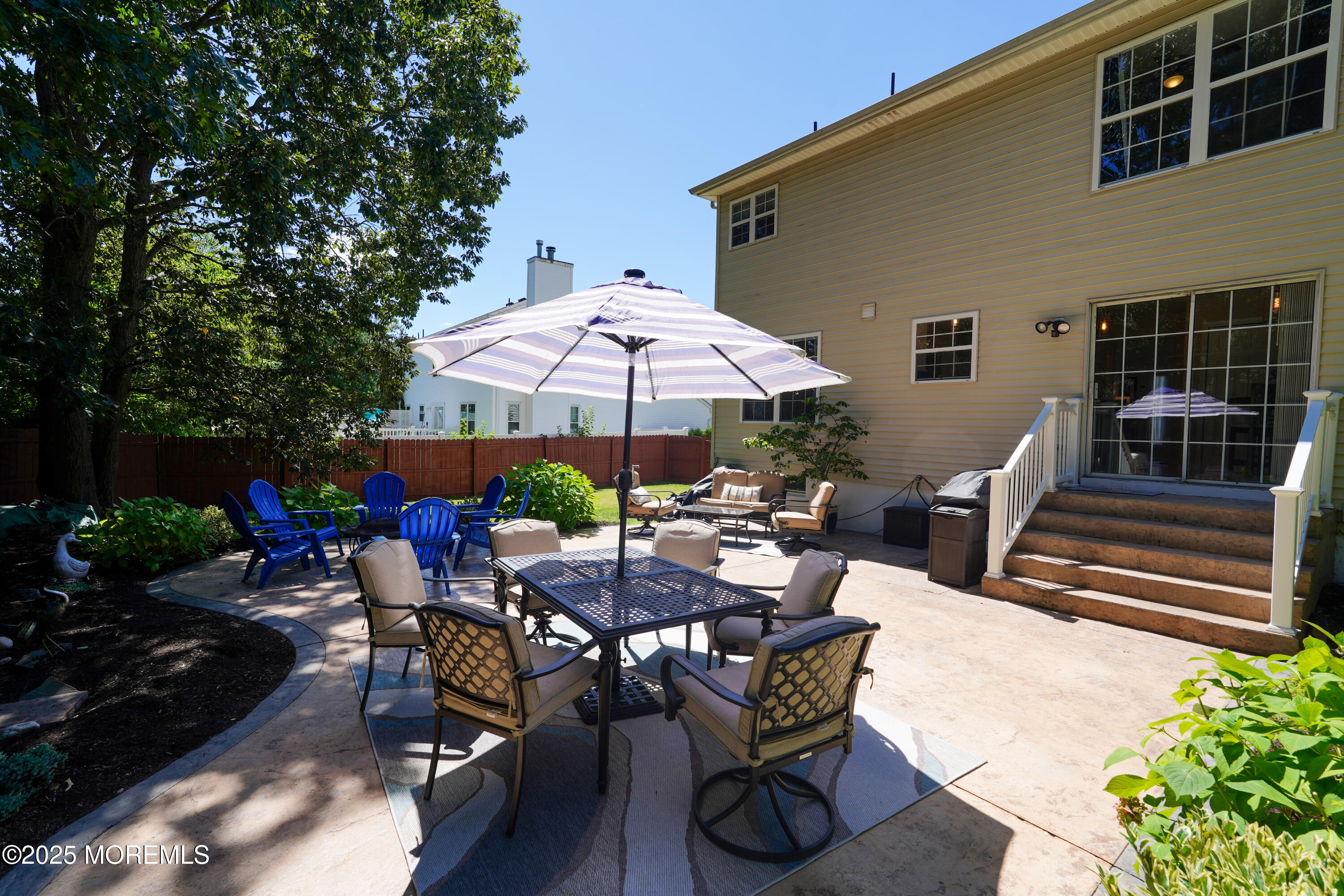 3 Diamond Lane Howell, NJ 07731 - Photo 34 of 43 a view of backyard with outdoor seating and trees