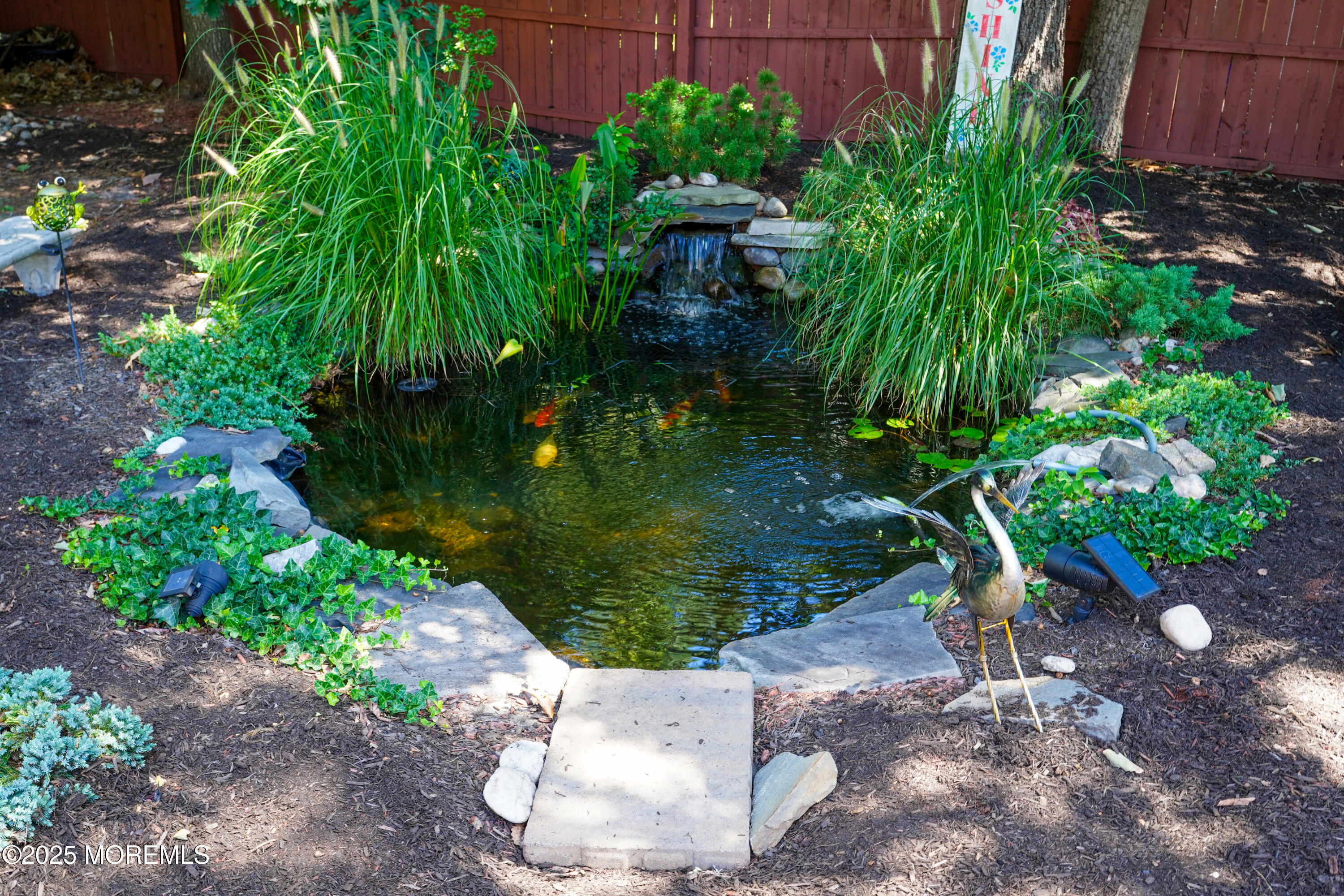 3 Diamond Lane Howell, NJ 07731 - Photo 37 of 43 a backyard of a house with lots of green space