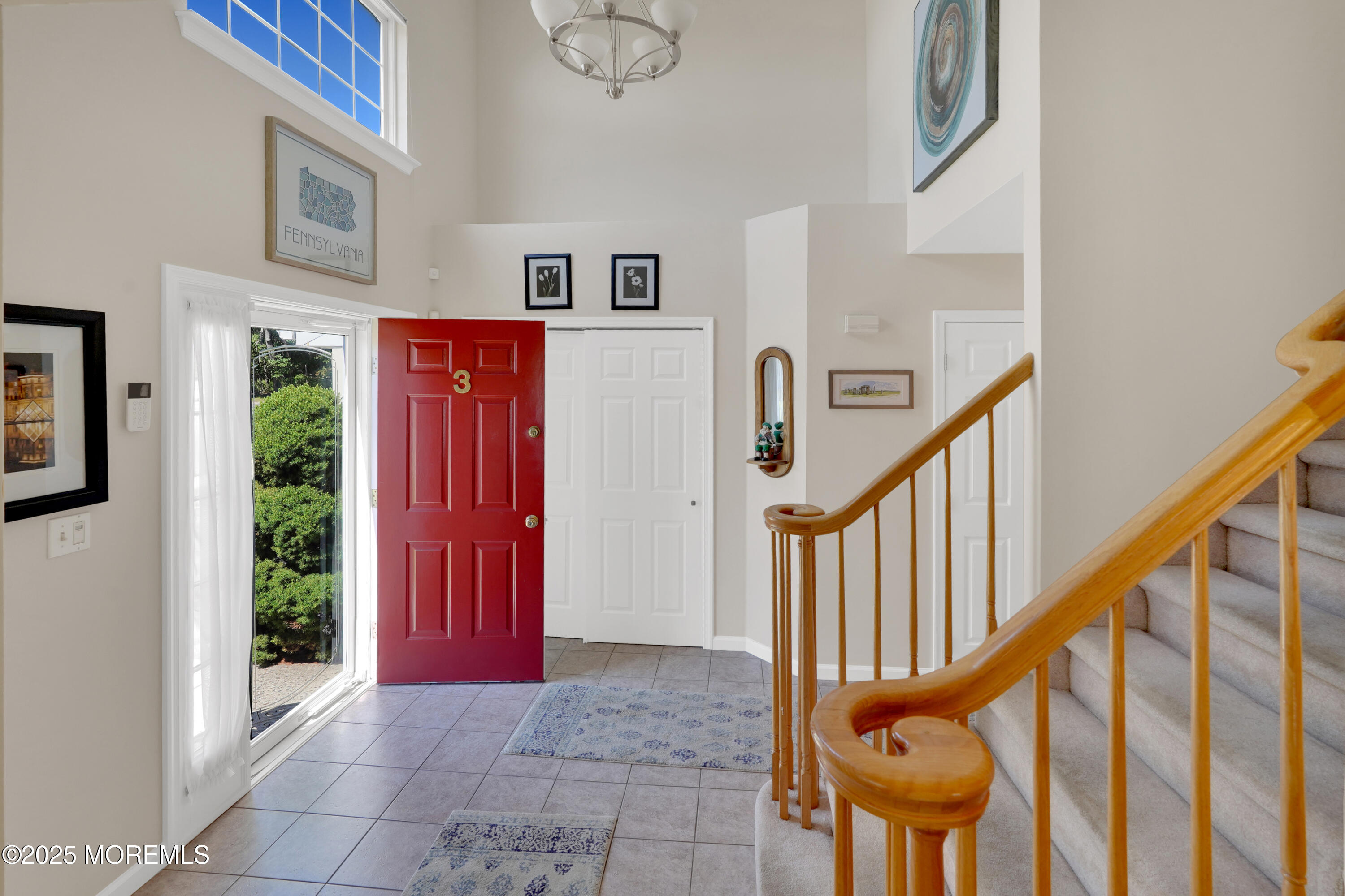 3 Diamond Lane Howell, NJ 07731 - Photo 5 of 43 a view of staircase with furniture and a window