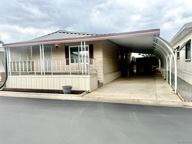 a view of a building with a porch