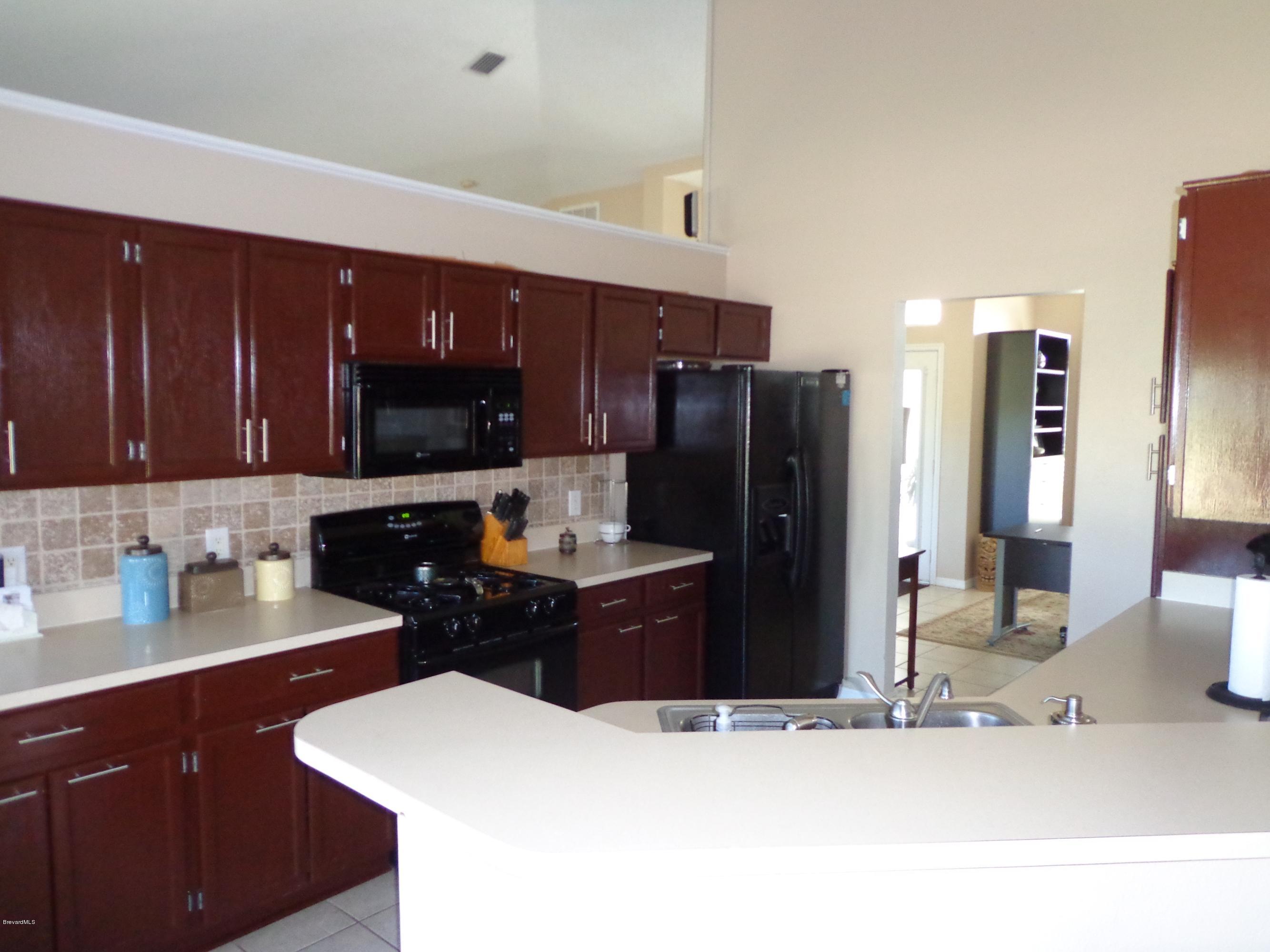 1228 Winding Meadows Road Rockledge, FL 32955 - Photo 5 of 20 Kithen opens to Family Room