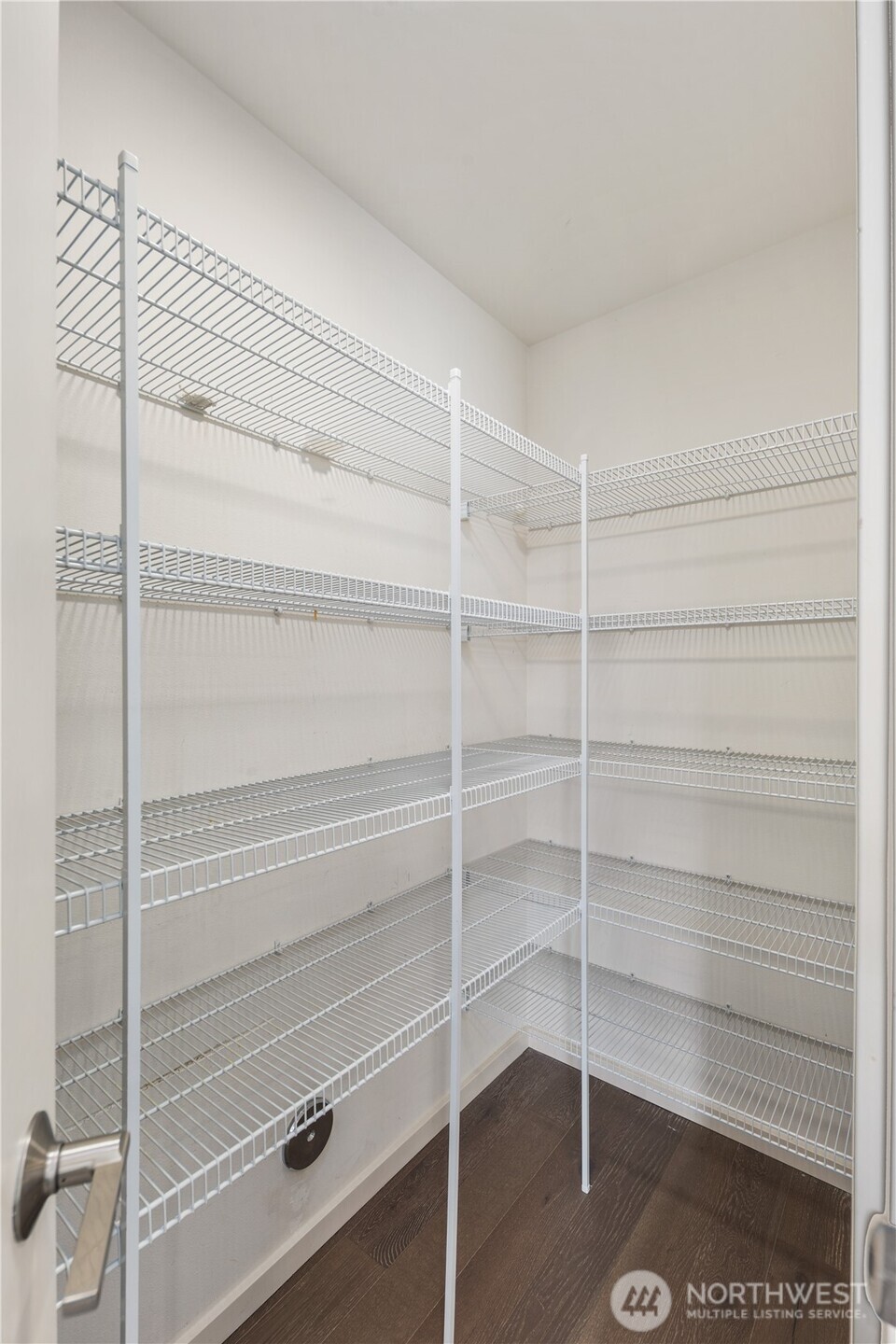 926 North 35th Street Seattle, WA 98103 - Photo 17 of 40 a view of a room with rack on the wall