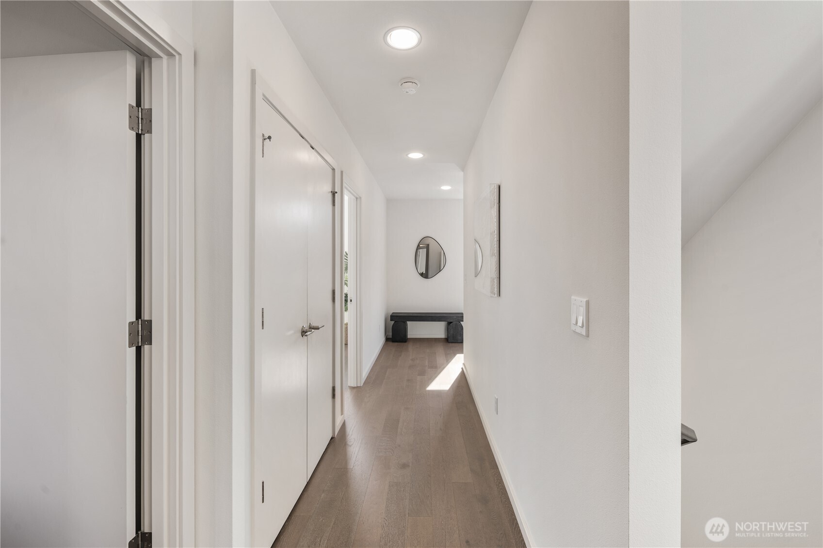 926 North 35th Street Seattle, WA 98103 - Photo 19 of 40 a view of a hallway with a white walls