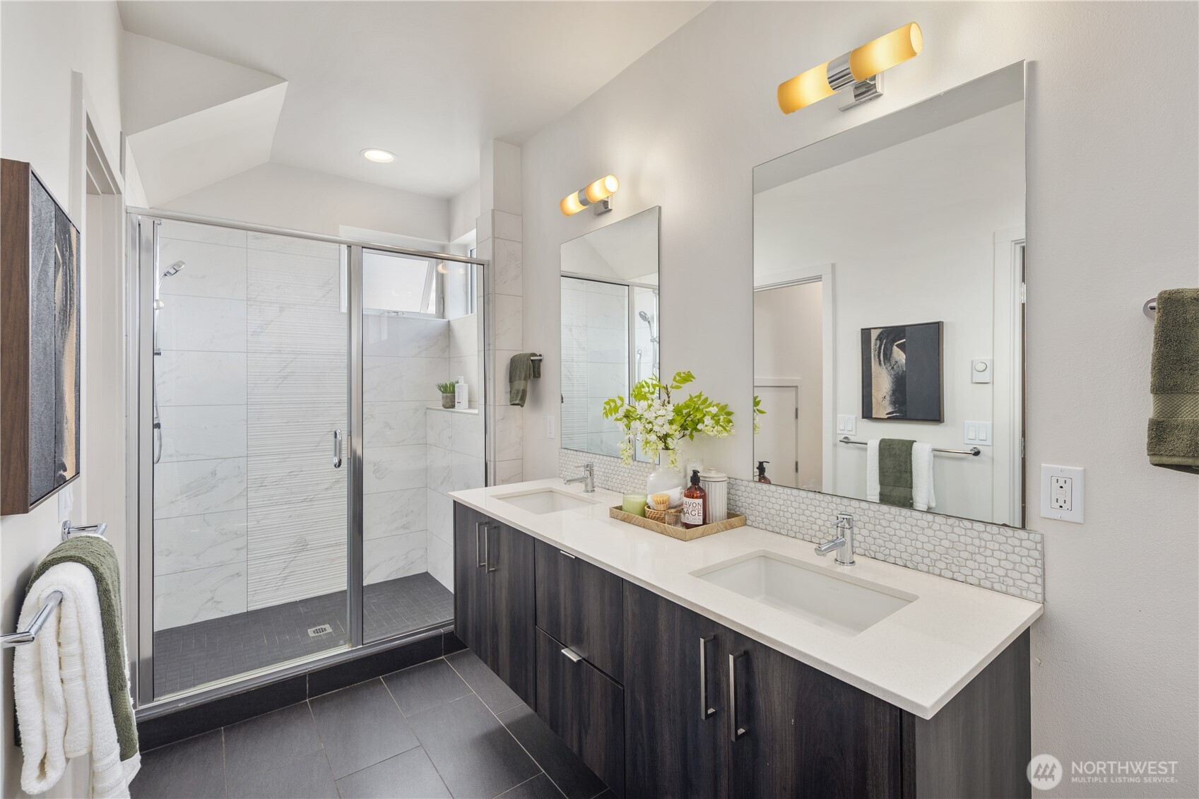 926 North 35th Street Seattle, WA 98103 - Photo 29 of 40 a bathroom with a sink and a mirror