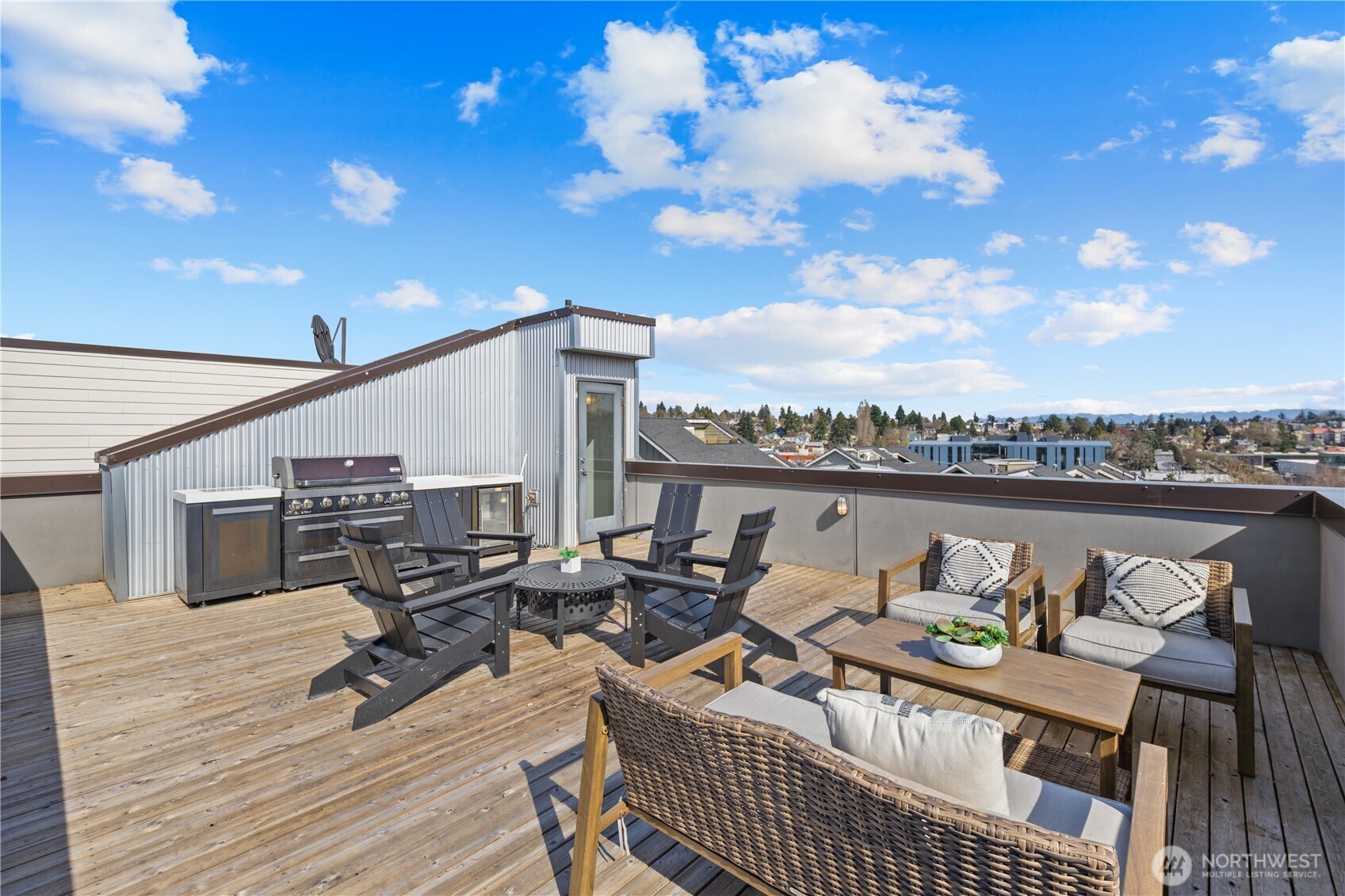 926 North 35th Street Seattle, WA 98103 - Photo 35 of 40 a terrace with outdoor seating and city view