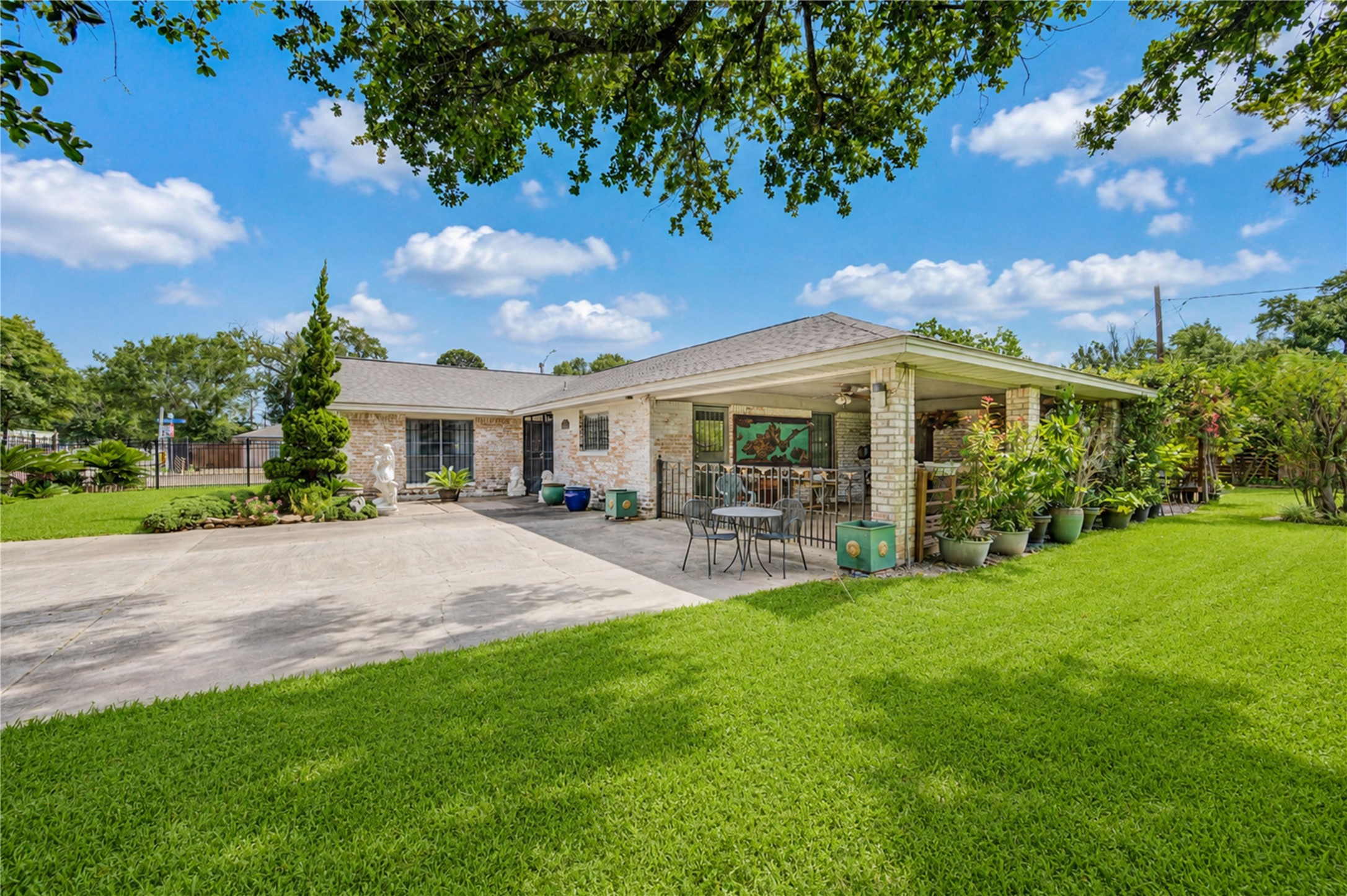 4018 Blalock Road Houston, TX 77080 - Photo 2 of 35 Charming single-story brick home with magnificent curb appeal, an immaculate lawn, and a spectacular covered patio designed for ultimate outdoor enjoyment. Truly a unique find!"