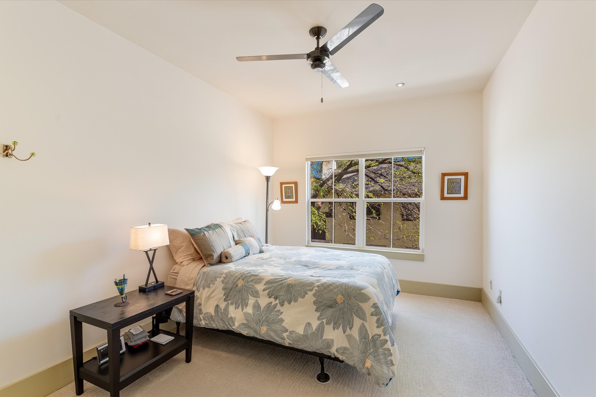 2405 Kinney Road, Unit 2405 Austin, TX 78704 - Photo 11 of 15 Carpeted bed room featuring a ceiling fan