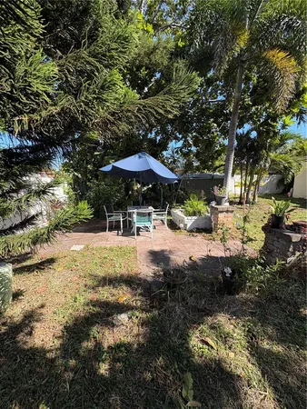 a view of swimming pool with a patio