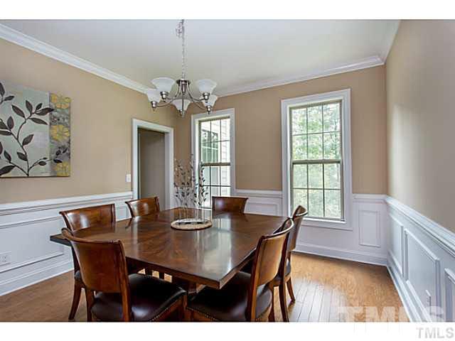 13028 Saxon Way Raleigh, NC 27613 - Photo 9 of 21 a view of a dining room with furniture and window
