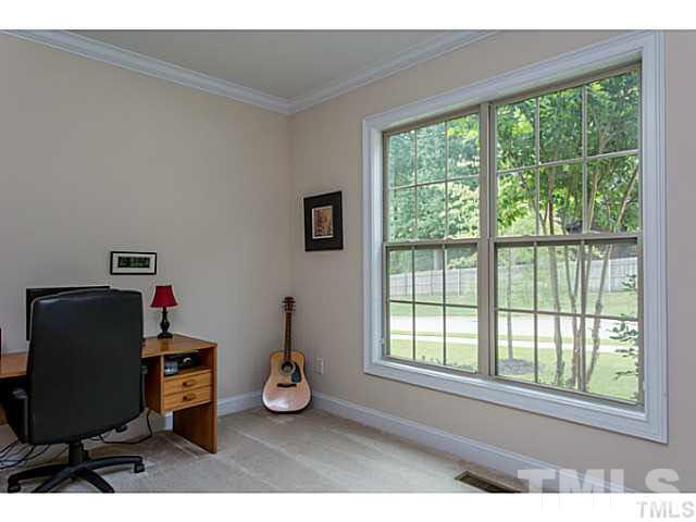 13028 Saxon Way Raleigh, NC 27613 - Photo 10 of 21 a view of a workspace with furniture and a window