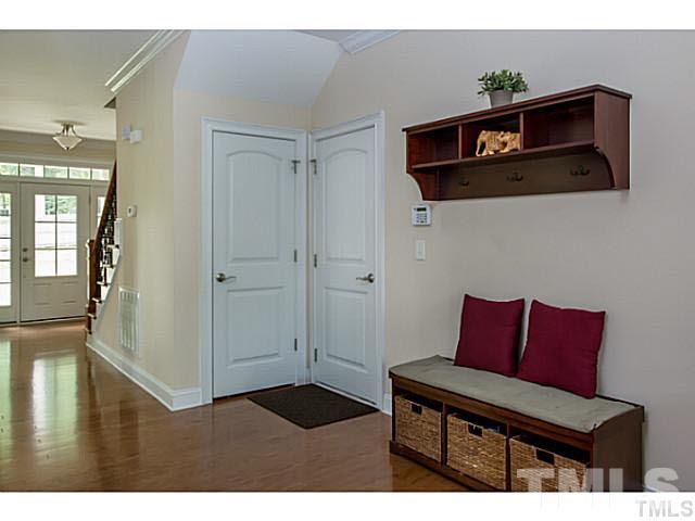 13028 Saxon Way Raleigh, NC 27613 - Photo 11 of 21 a view of a livingroom with furniture and wooden floor