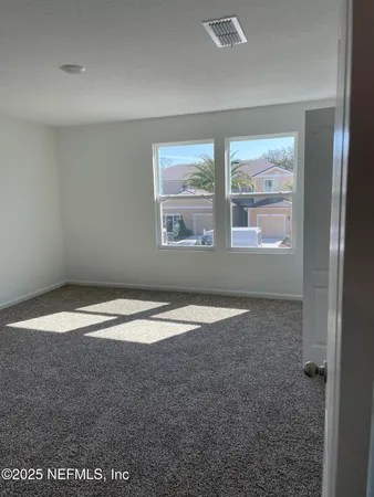 a view of empty room with window