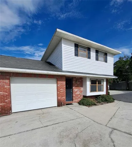 a front view of house with yard
