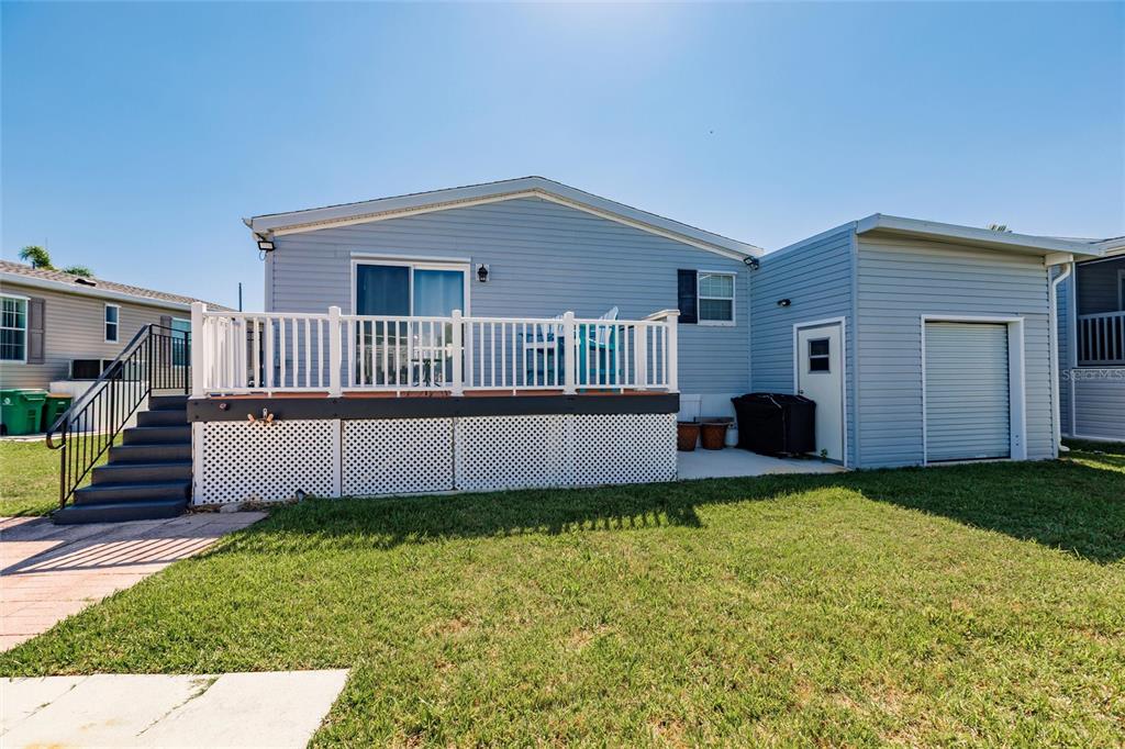 21 Rotterdam Punta Gorda, FL 33950 - Photo 20 of 40 a view of a house with a yard