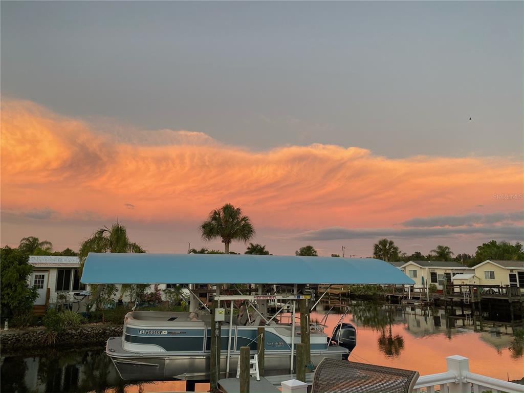 21 Rotterdam Punta Gorda, FL 33950 - Photo 23 of 40 a view of a lake with houses
