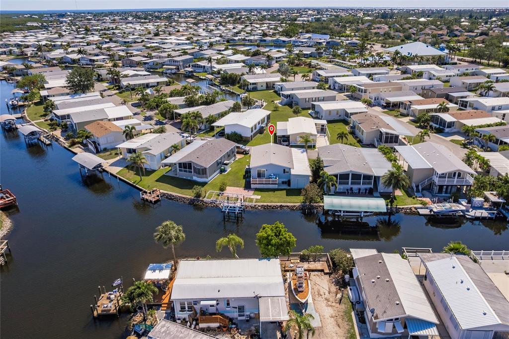 21 Rotterdam Punta Gorda, FL 33950 - Photo 30 of 40 an aerial view of a houses with yard