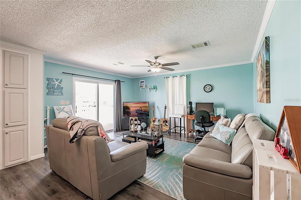 21 Rotterdam Punta Gorda, FL 33950 - Photo 6 of 40 a living room with furniture and a window