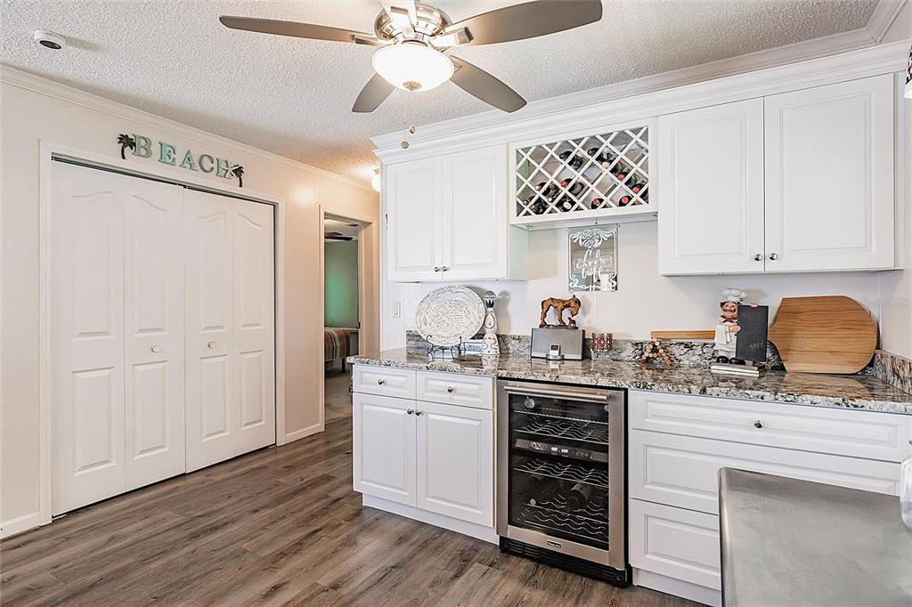 21 Rotterdam Punta Gorda, FL 33950 - Photo 8 of 40 a kitchen with stainless steel appliances a stove sink and cabinets