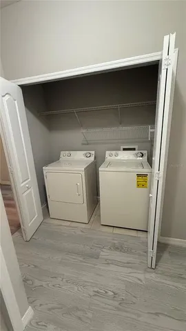 a view of entryway with wooden floor