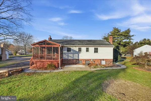 a front view of house with yard and seating area