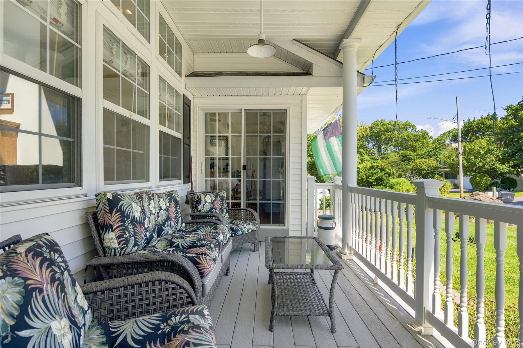 85 Maple Road Rocky Point, NY 11778 - Photo 30 of 40 Cozy rocking chair porch with entry to great room or formal dining room