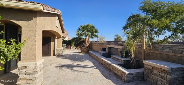 a house view with a outdoor space