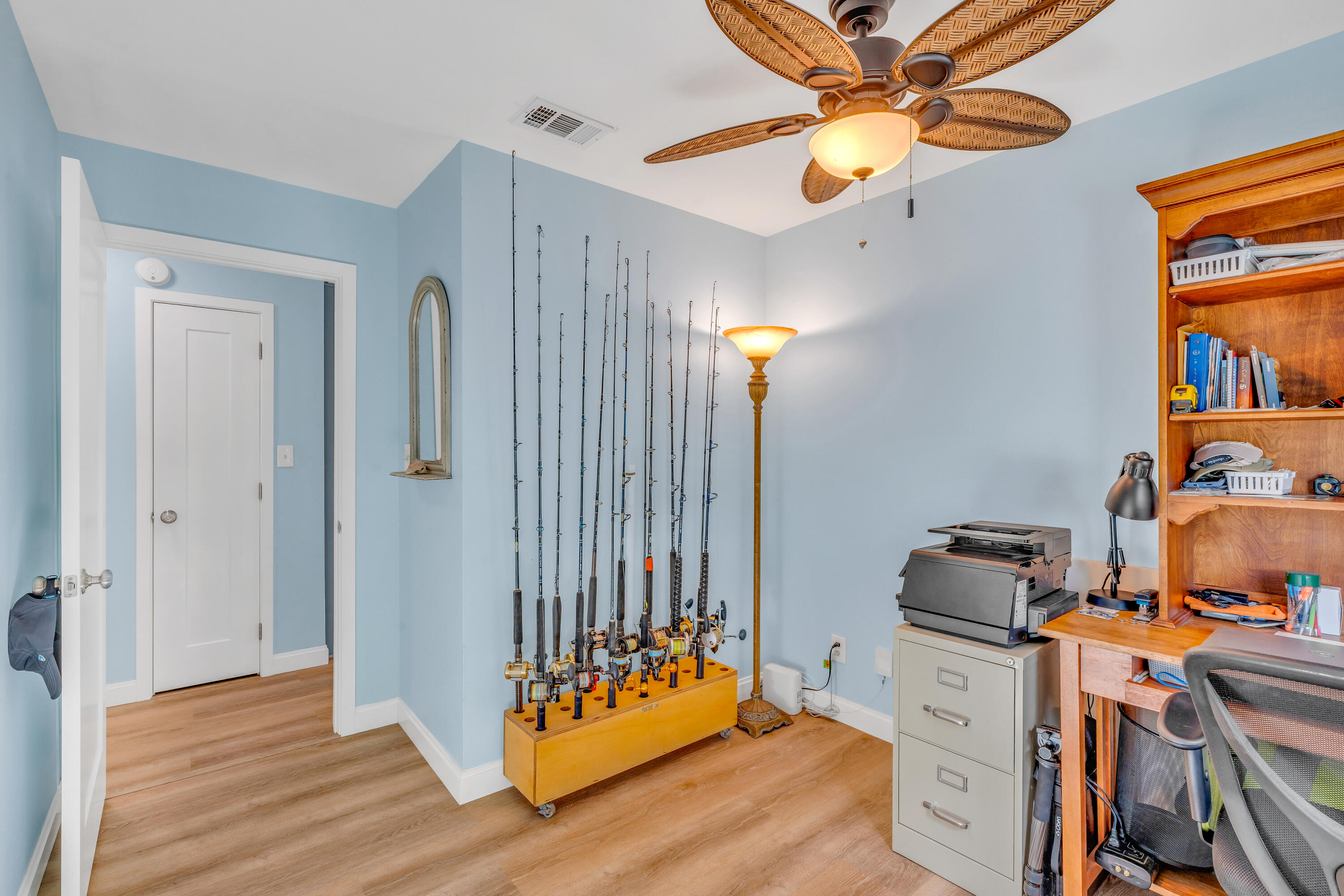 3987 Gordon Road Big Pine Key, FL 33043 - Photo 20 of 49 a view of a workspace with furniture and staircase