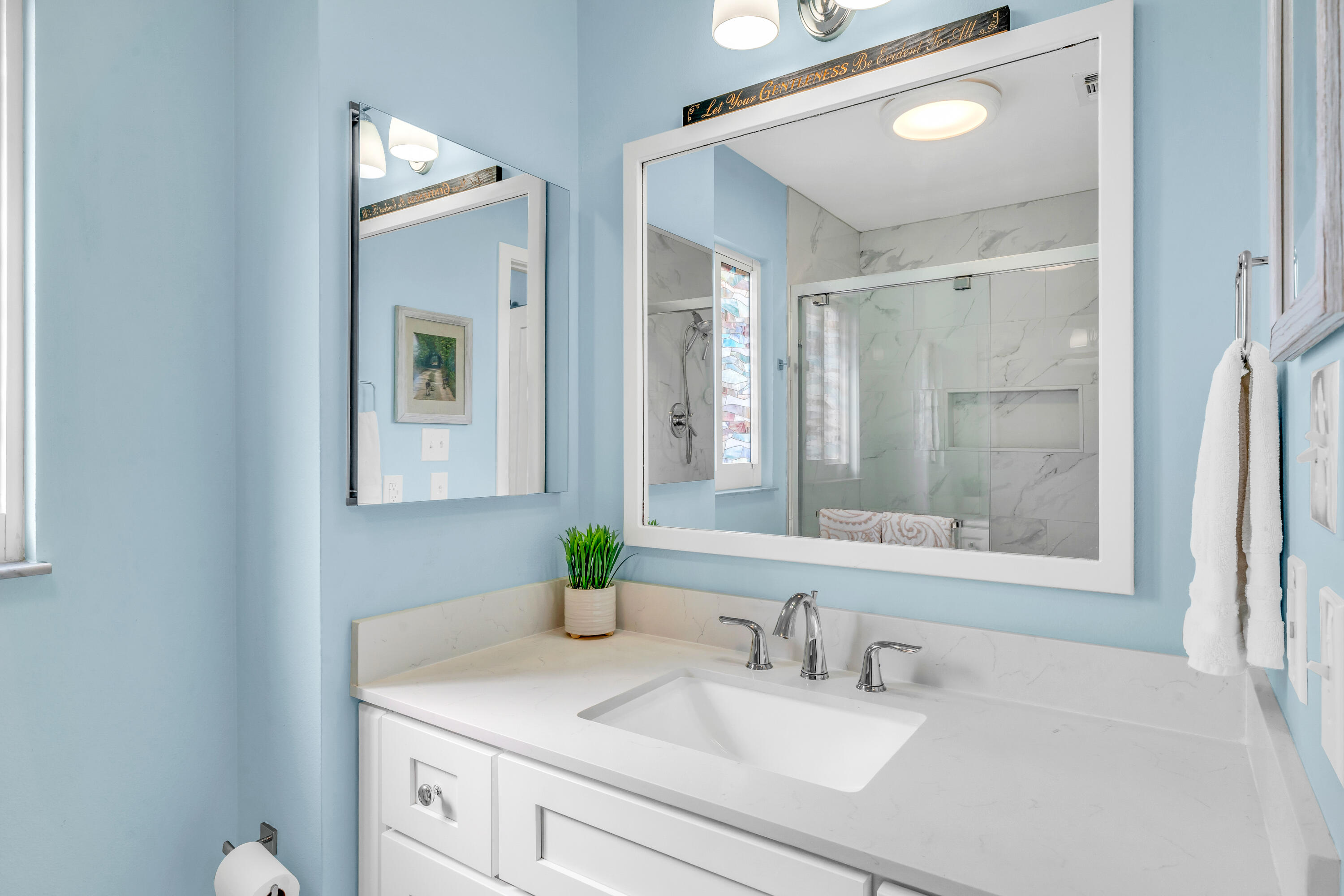 3987 Gordon Road Big Pine Key, FL 33043 - Photo 30 of 49 a bathroom with a granite countertop sink and a mirror