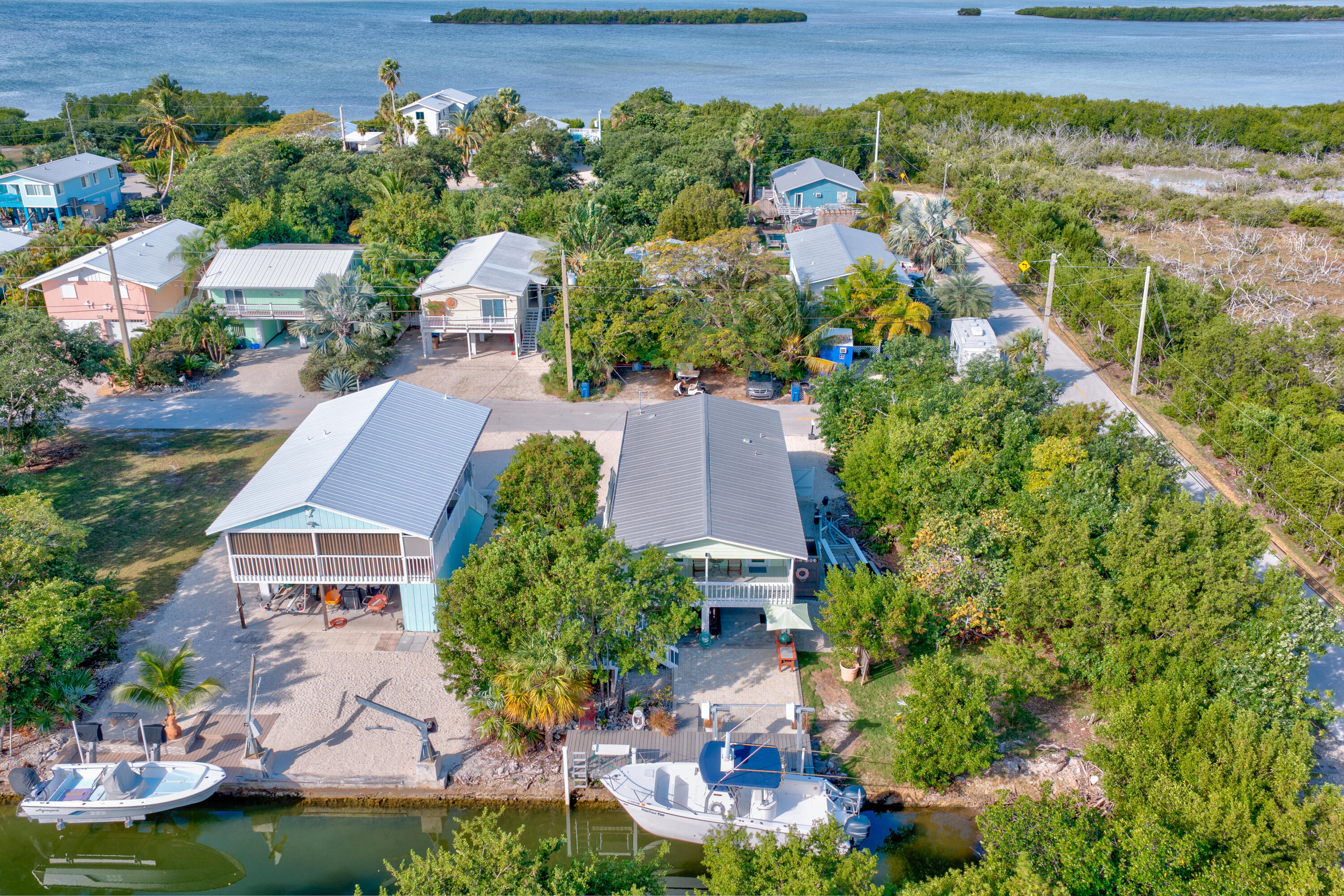 3987 Gordon Road Big Pine Key, FL 33043 - Photo 31 of 49 an aerial view of multiple houses with yard
