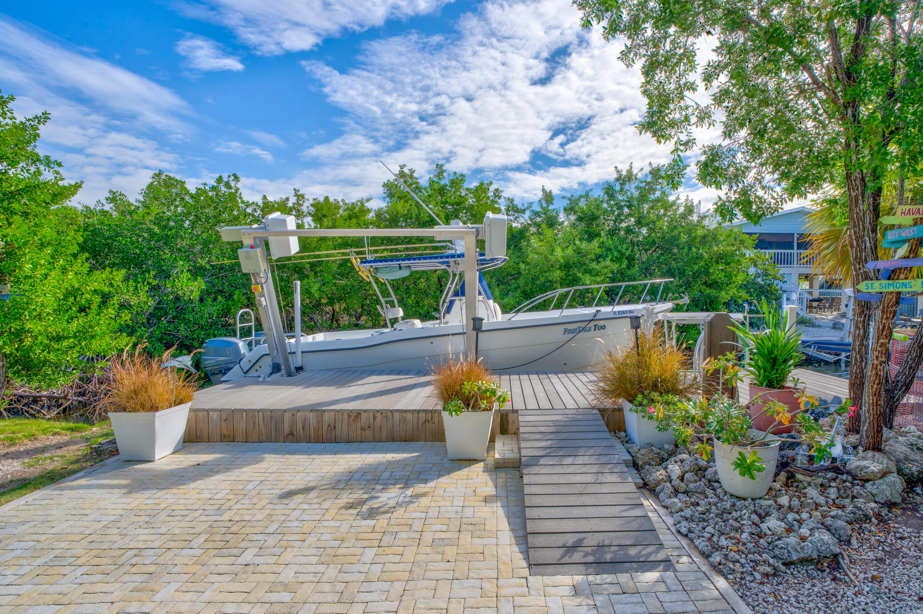 3987 Gordon Road Big Pine Key, FL 33043 - Photo 34 of 49 a view of a garden with sitting area