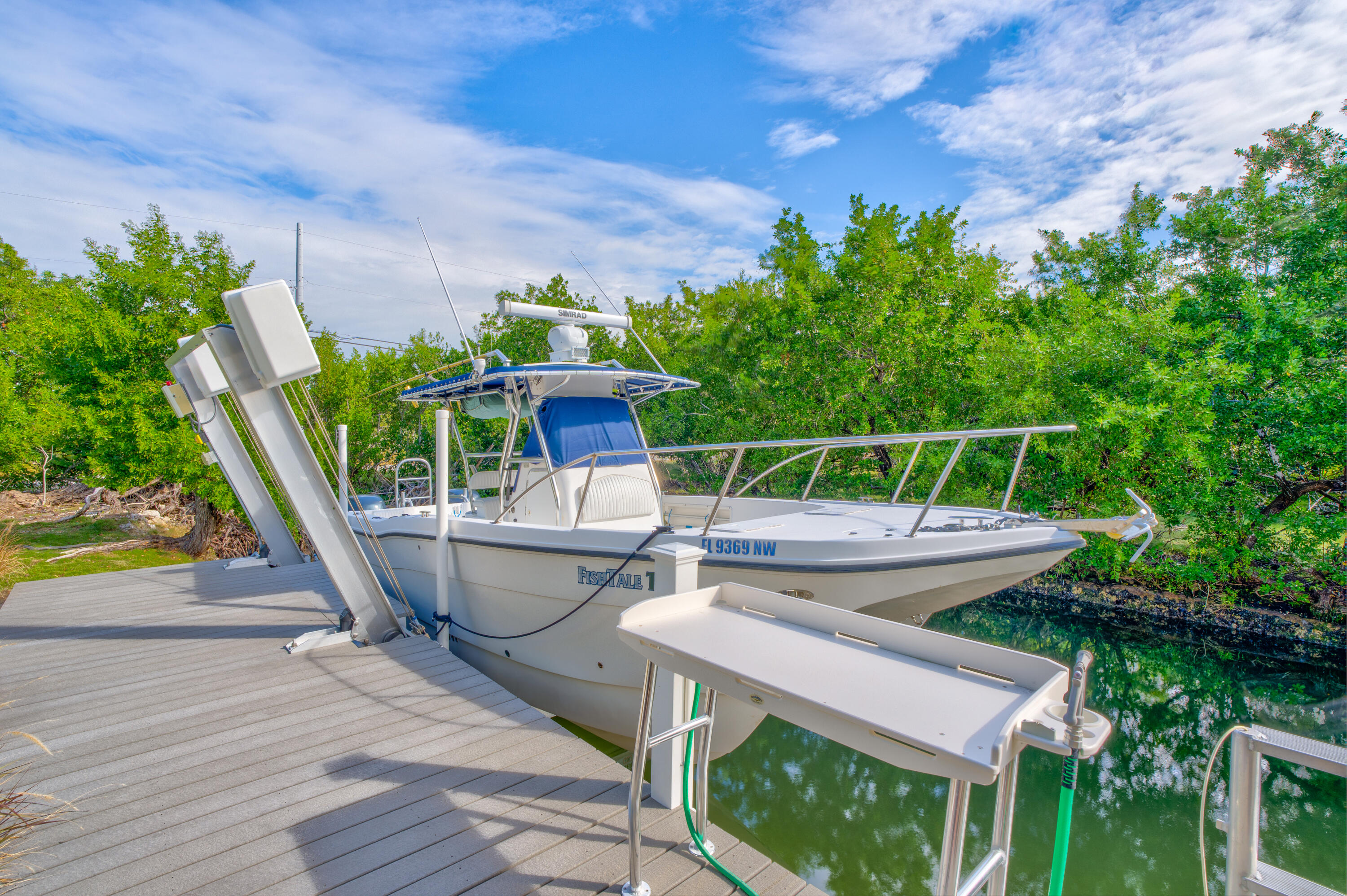 3987 Gordon Road Big Pine Key, FL 33043 - Photo 37 of 49 a view of backyard with seating area and green space