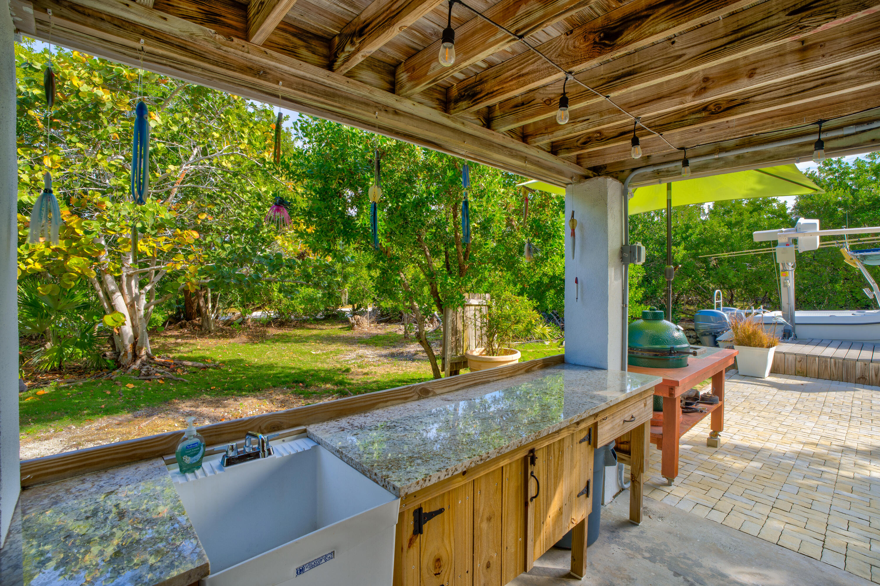 3987 Gordon Road Big Pine Key, FL 33043 - Photo 8 of 49 a view of a porch with furniture and garden