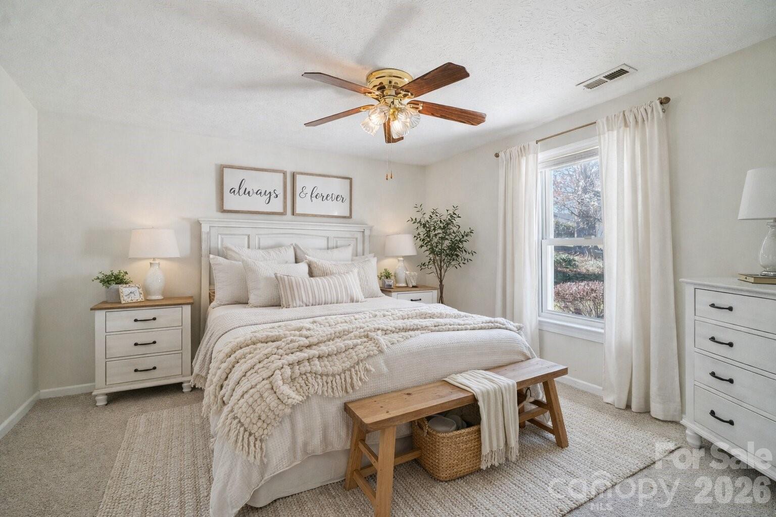 511 Oak Grove Road Flat Rock, NC 28731 - Photo 19 of 38 a bed room with a bed and a window