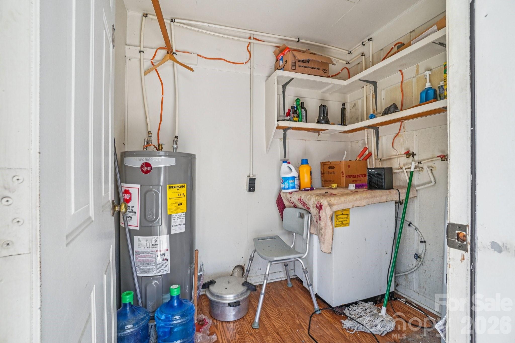 511 Oak Grove Road Flat Rock, NC 28731 - Photo 30 of 38 a utility room with dryer and washer