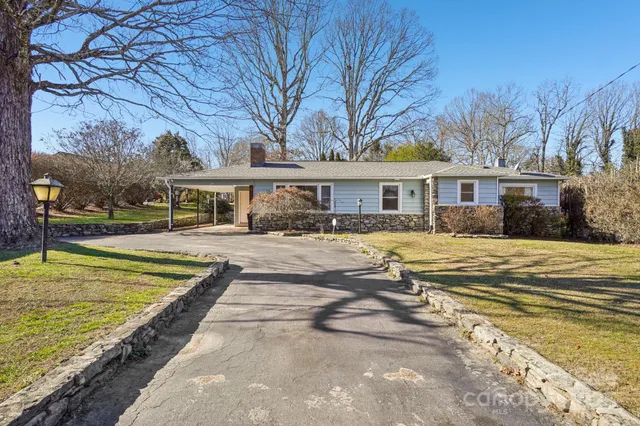 a view of a house with a swimming pool