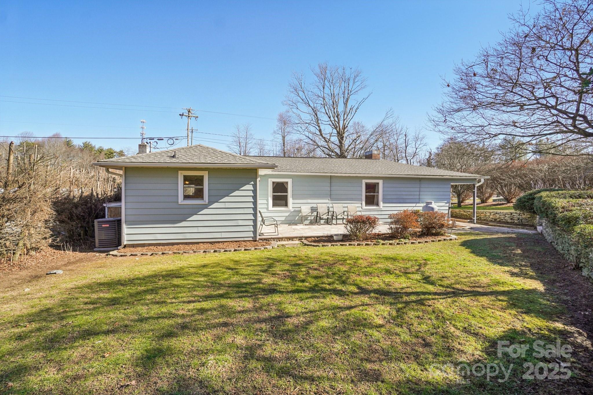 511 Oak Grove Road Flat Rock, NC 28731 - Photo 34 of 34 a front view of a house with a patio