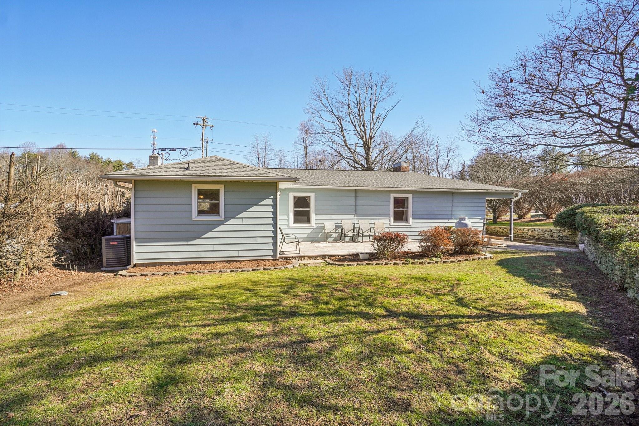 511 Oak Grove Road Flat Rock, NC 28731 - Photo 38 of 38 a front view of a house with a patio