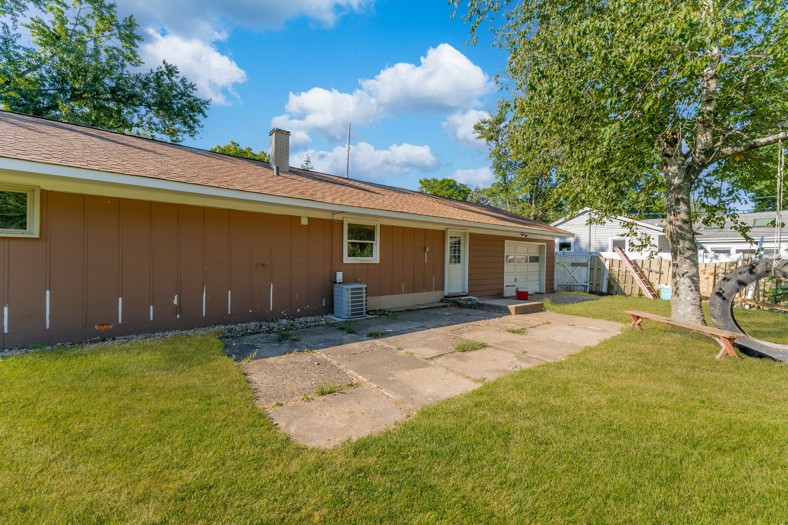 435 Douglas Road Batavia, IL 60510 - Photo 20 of 24 a view of a house with backyard and a tree
