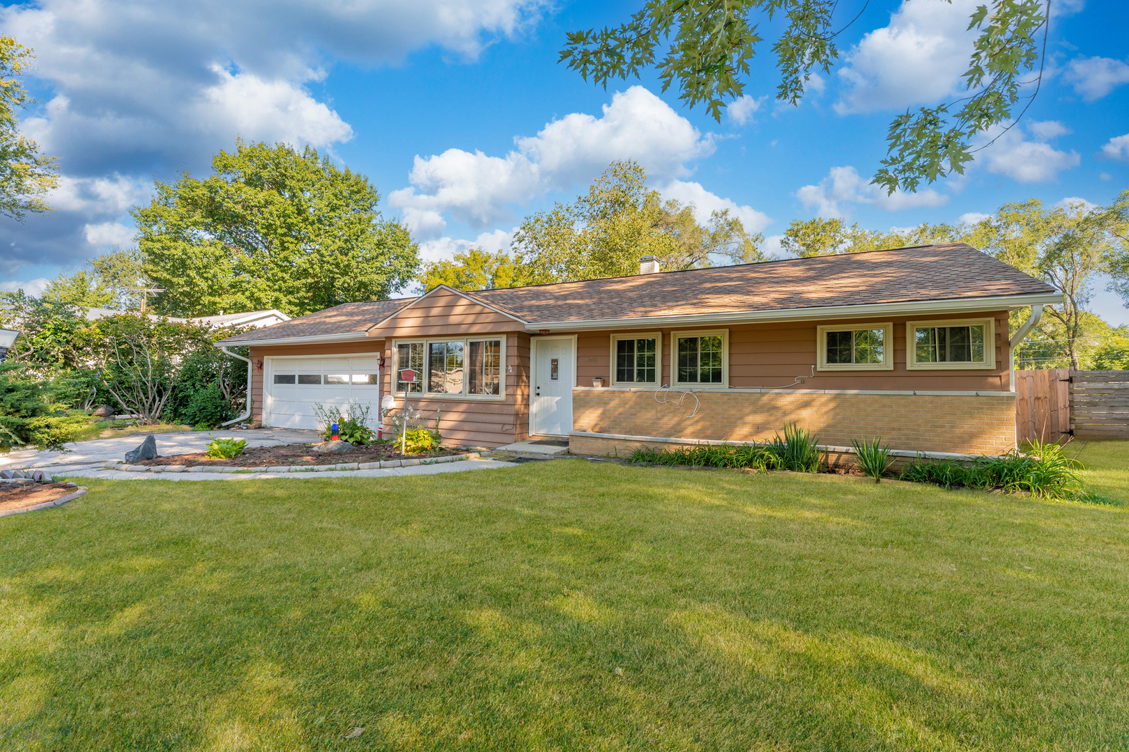 435 Douglas Road Batavia, IL 60510 - Photo 3 of 24 a front view of house with yard barbeque and outdoor seating