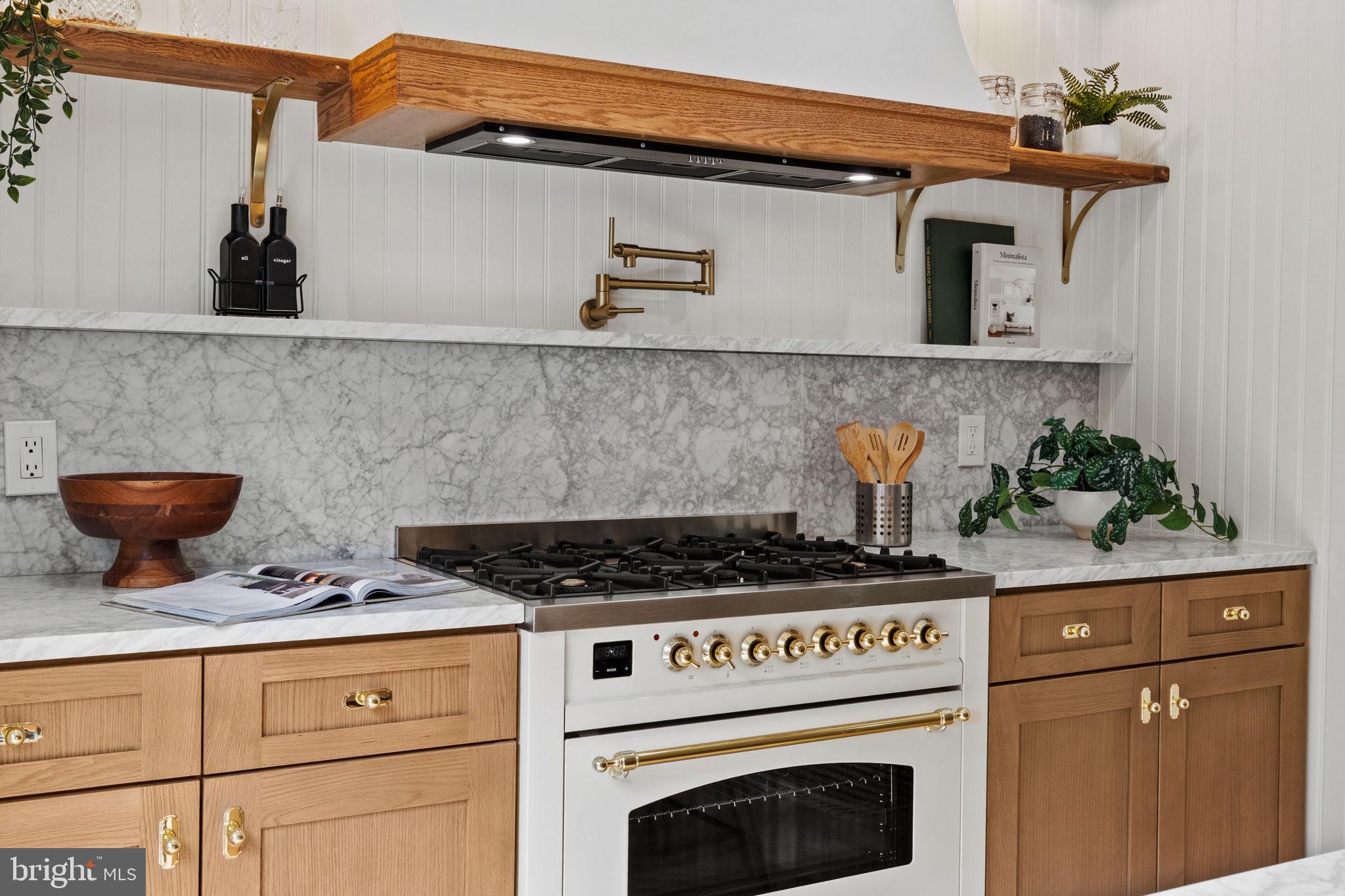 914 Fernon Street Philadelphia, PA 19148 - Photo 2 of 40 a kitchen with a stove and cabinets