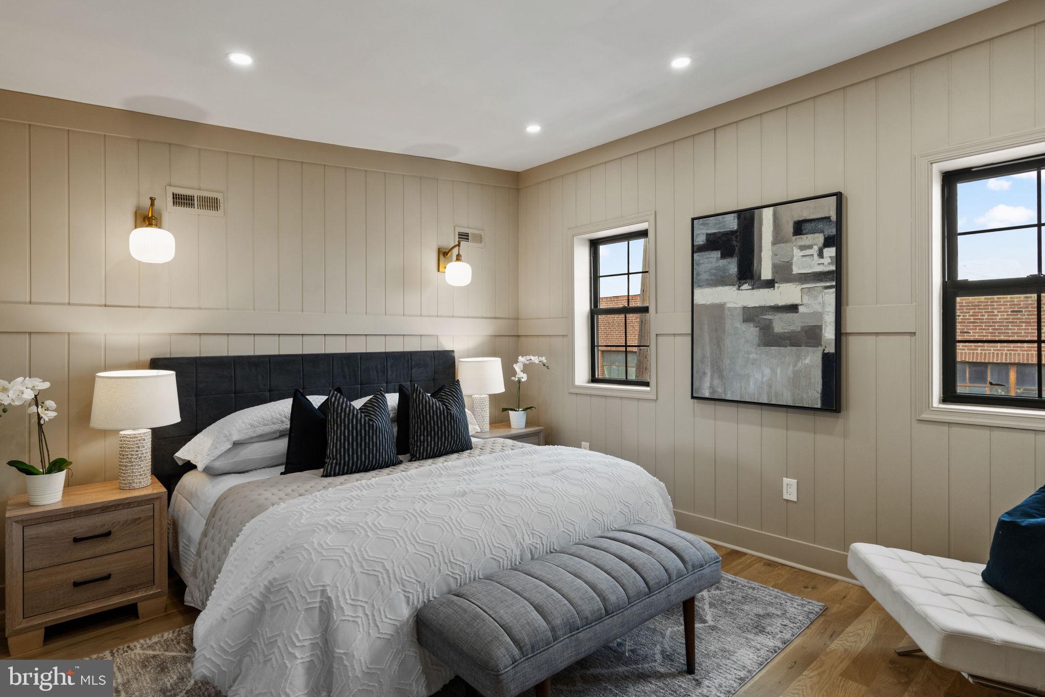 914 Fernon Street Philadelphia, PA 19148 - Photo 24 of 40 a bedroom with a bed and night stand