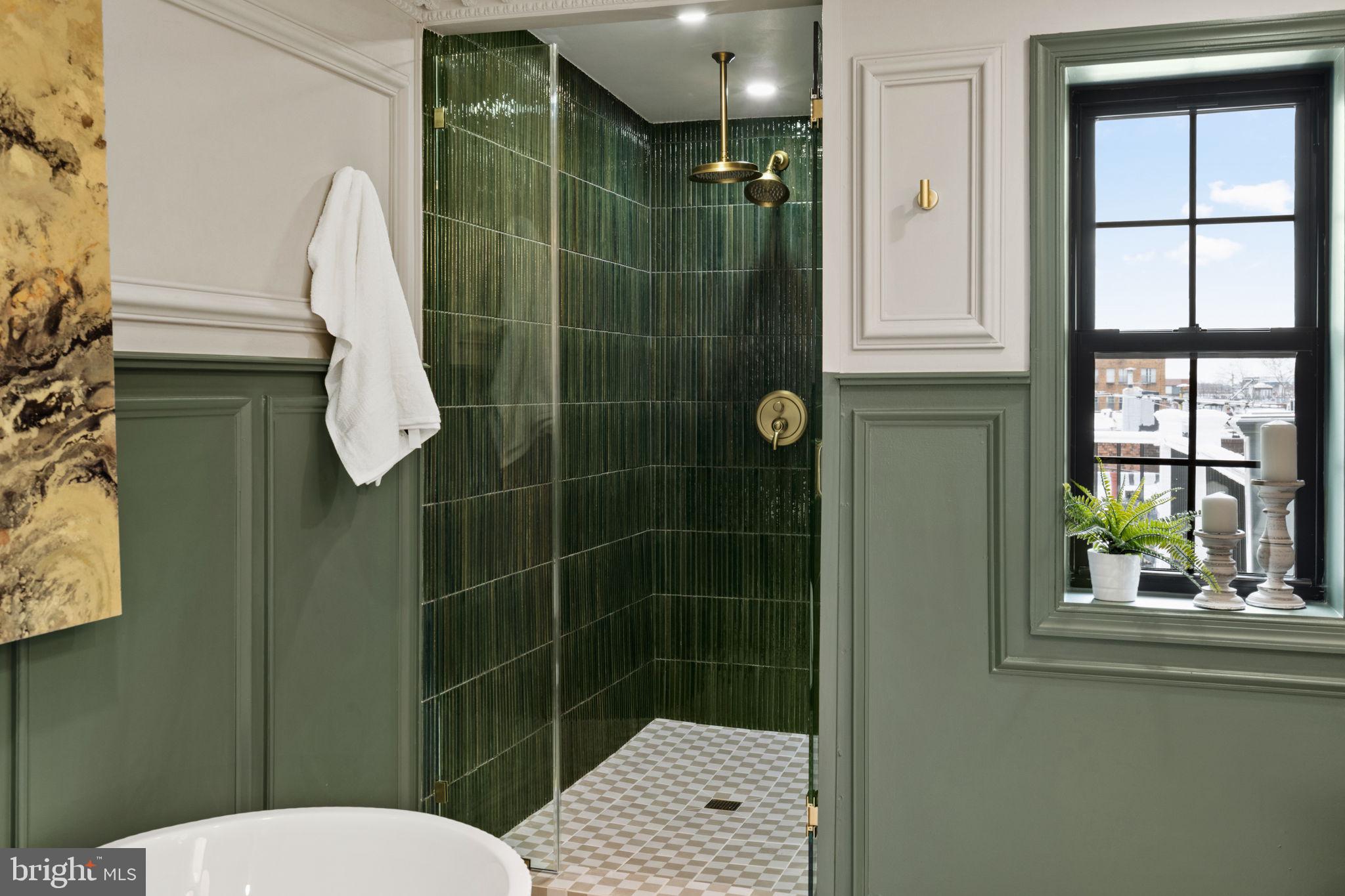 914 Fernon Street Philadelphia, PA 19148 - Photo 30 of 40 a bathroom with a toilet a sink and shower