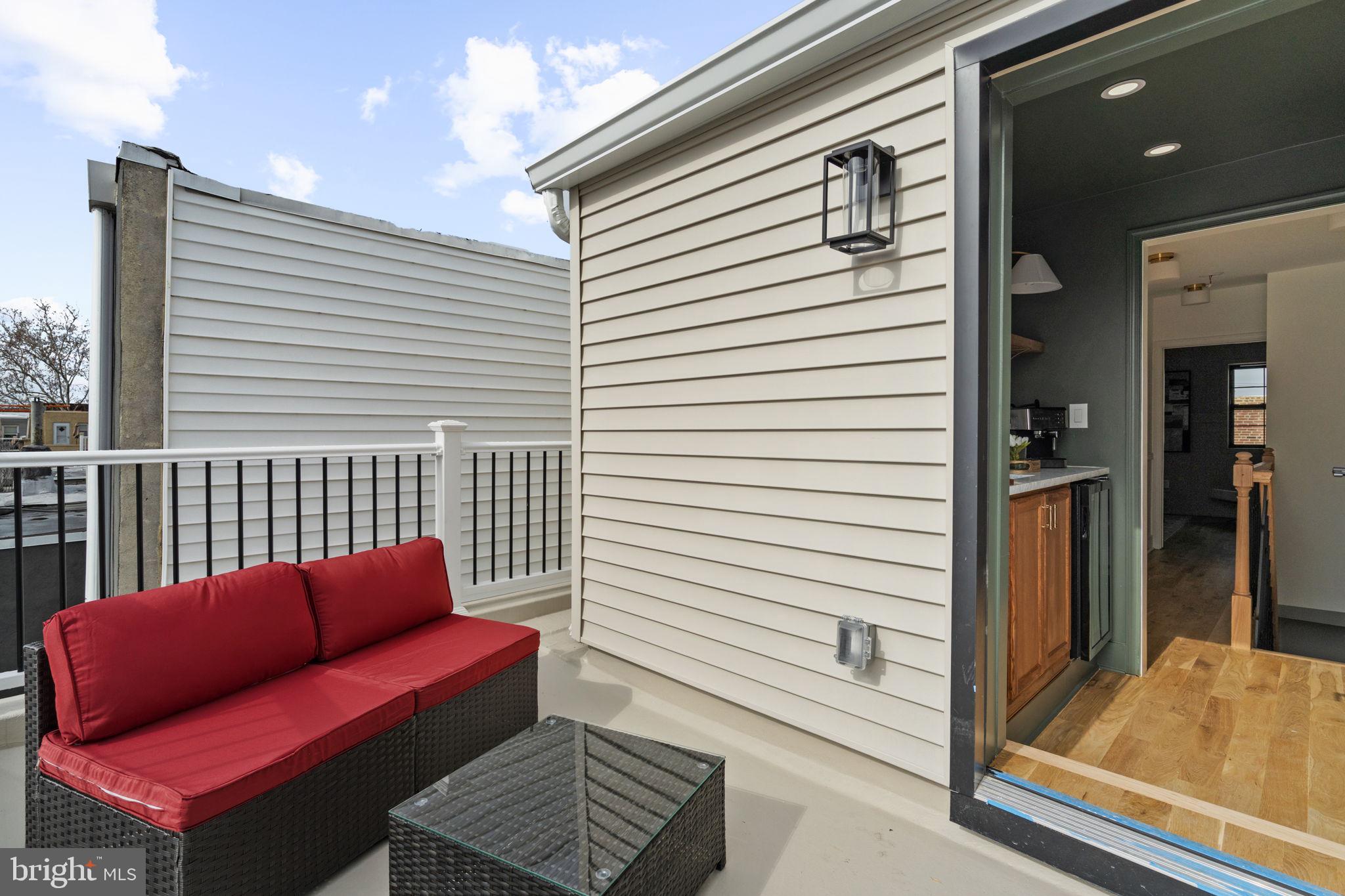 914 Fernon Street Philadelphia, PA 19148 - Photo 34 of 40 a balcony with furniture
