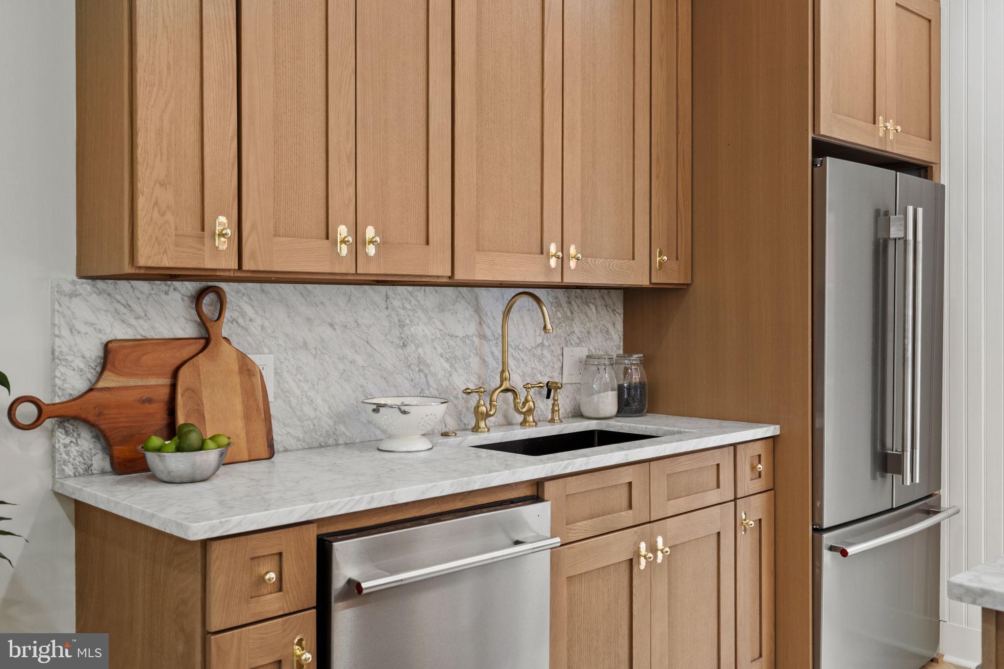 914 Fernon Street Philadelphia, PA 19148 - Photo 4 of 40 a kitchen with a sink and cabinets