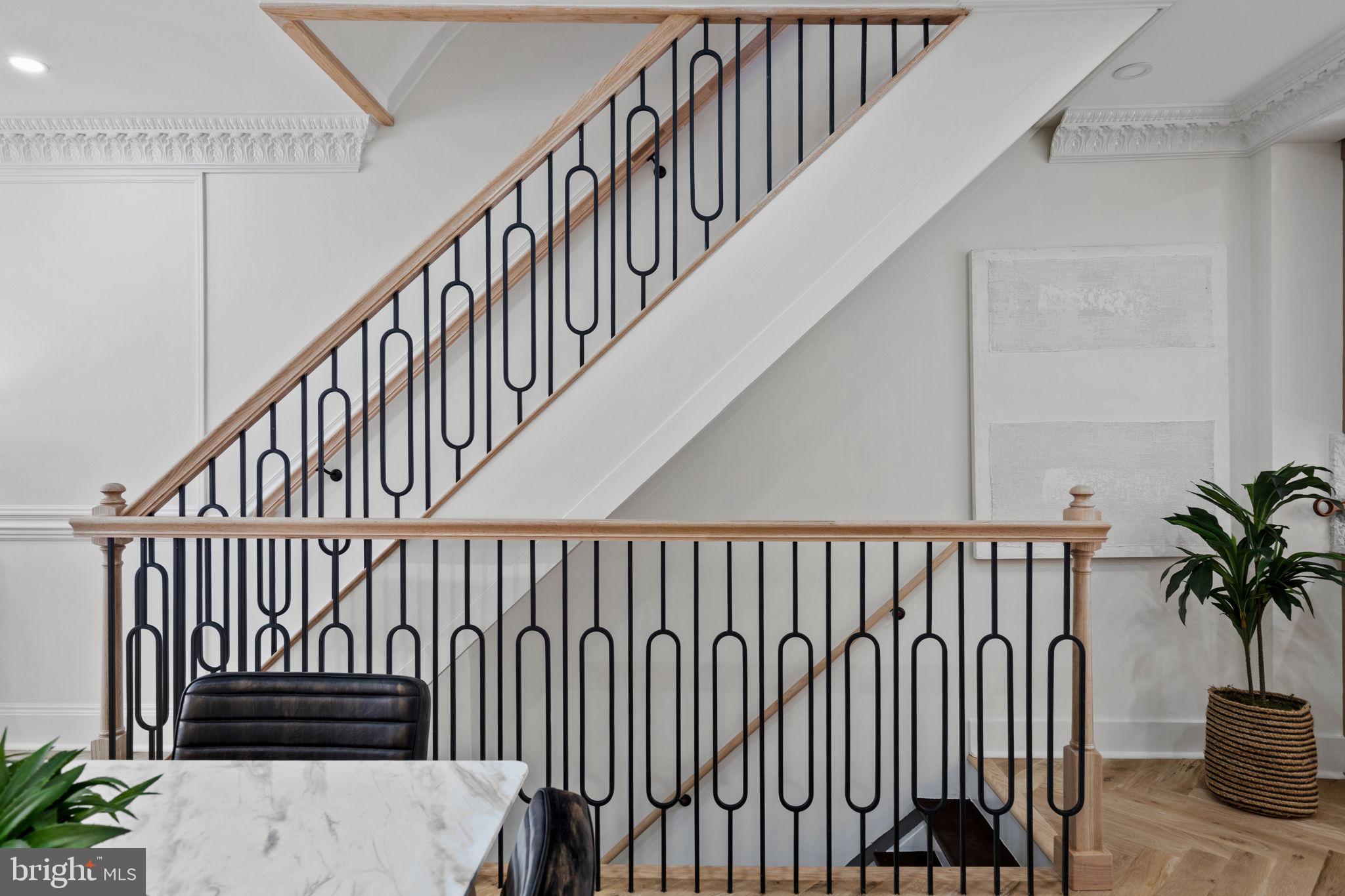914 Fernon Street Philadelphia, PA 19148 - Photo 7 of 40 a view of staircase with railing and white walls
