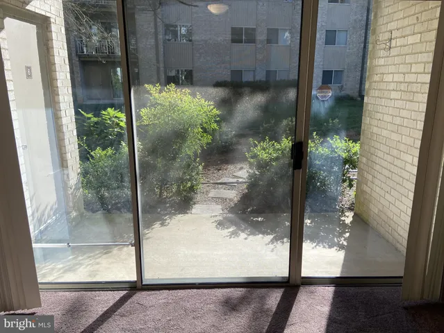 a bathroom with a glass door