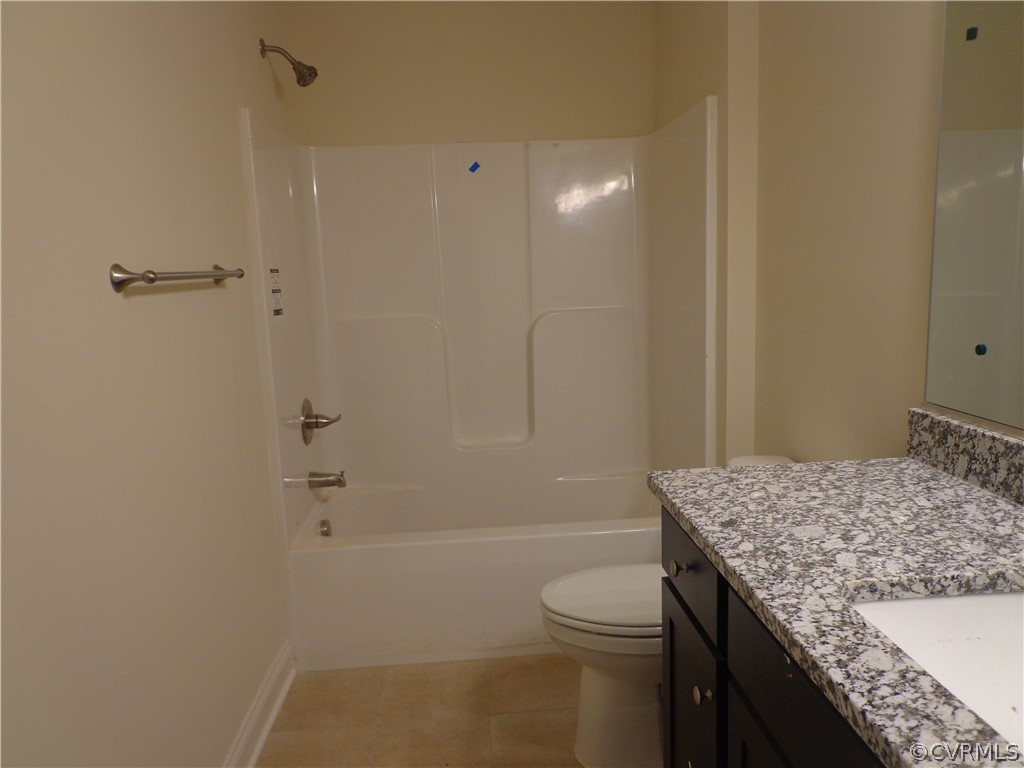 6010 Watch Harbour Road Midlothian, VA 23112 - Photo 12 of 30 a bathroom with a granite countertop sink a toilet and shower