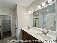 268 Brickhill Drive Raeford, NC 28376 - Photo 11 of 21 a bathroom with a sink double vanity and a mirror